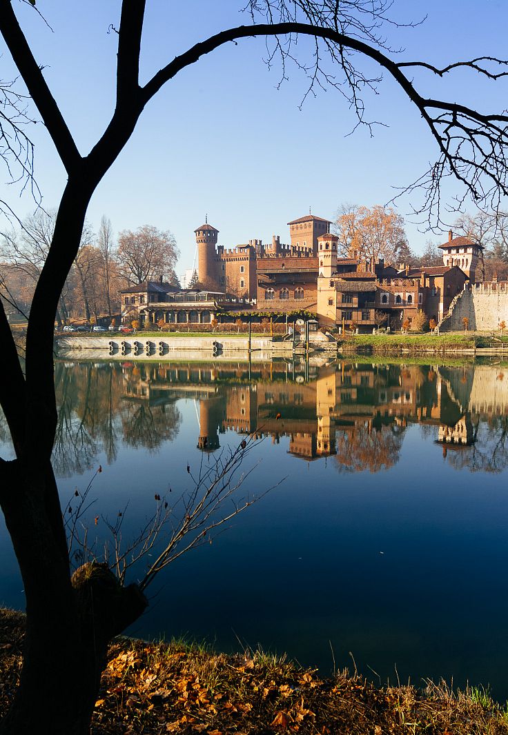 Castello del Valentino reflected on Po river, Torino, Italy